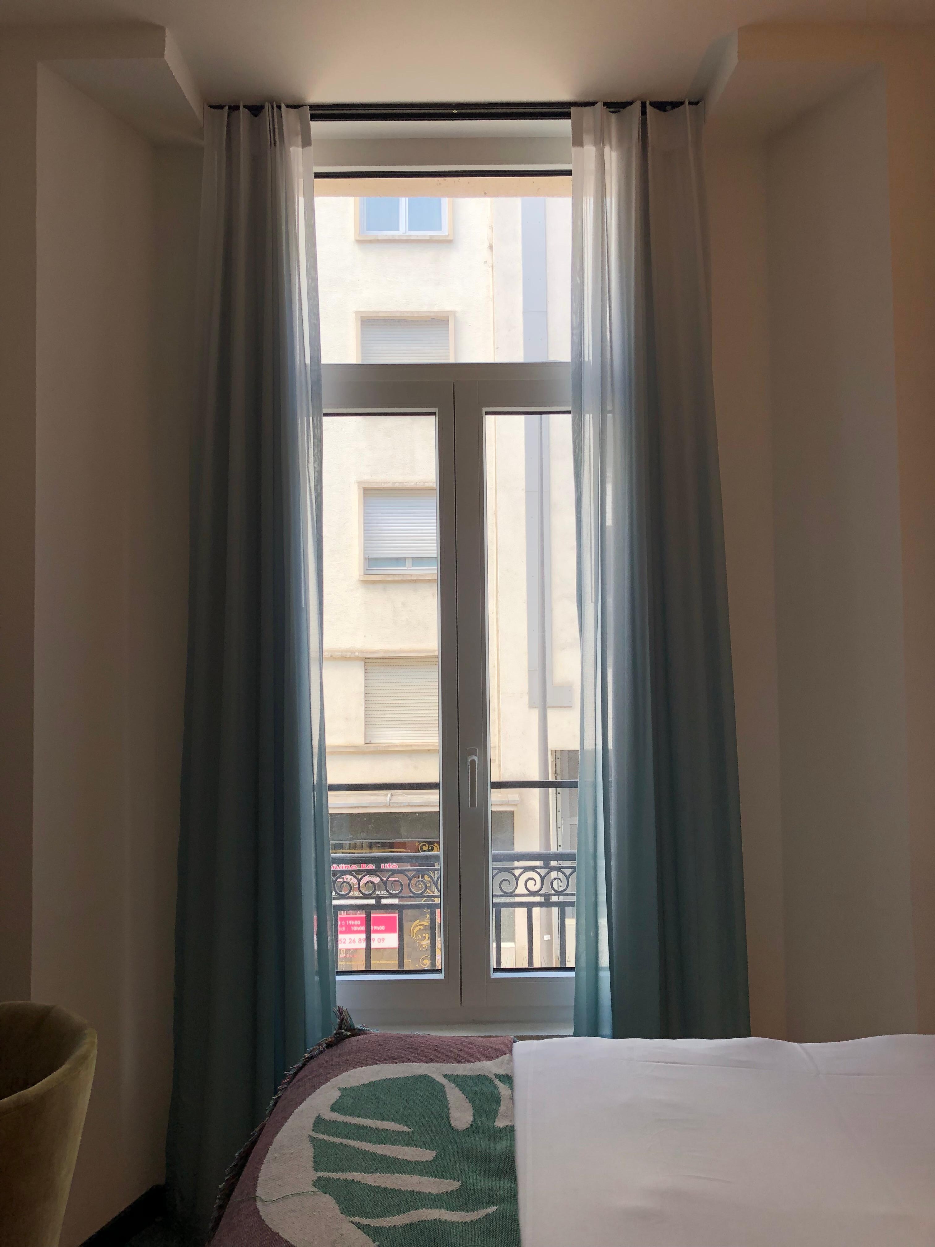 Room window overlooking the street. 