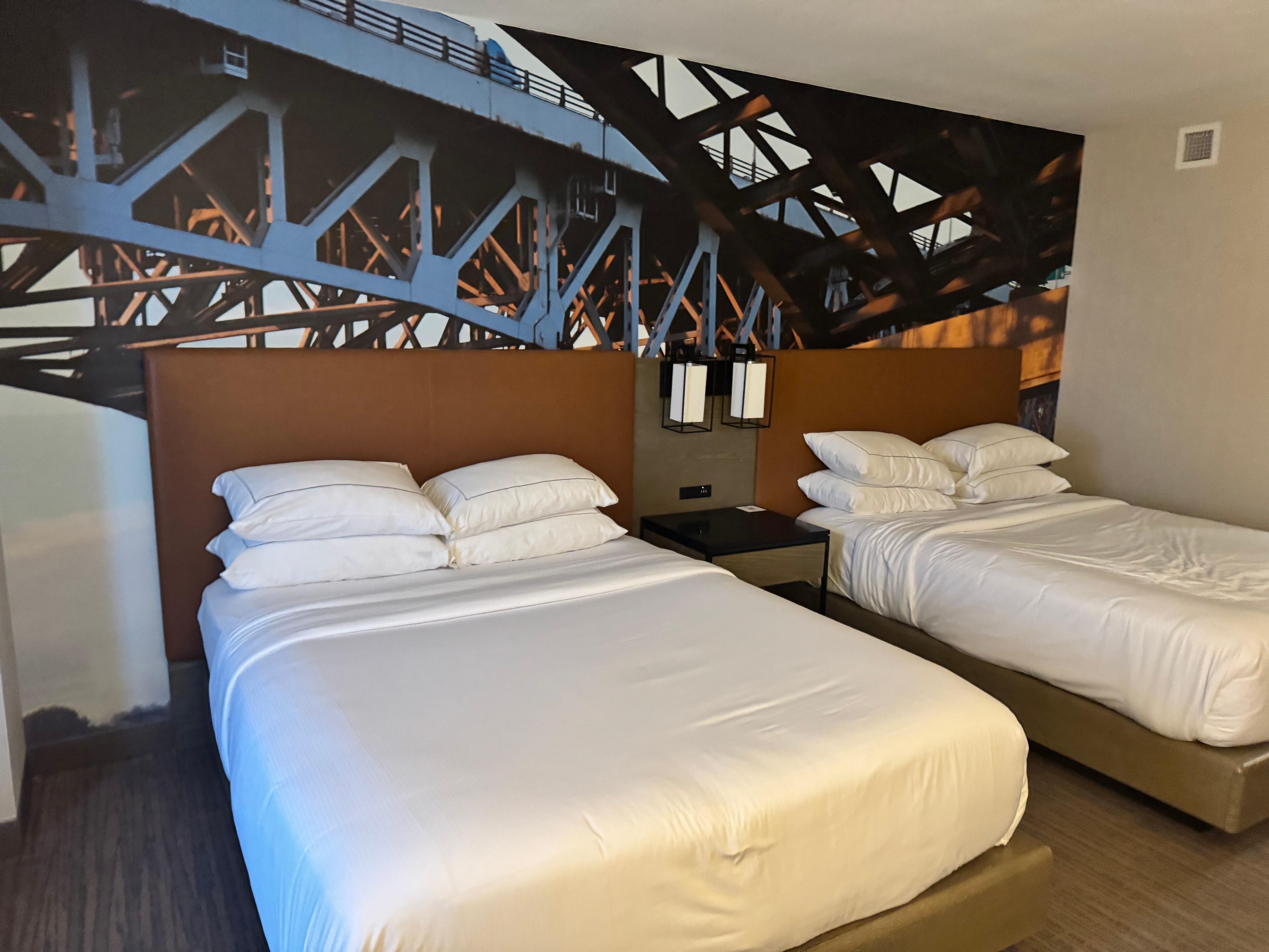 The art on the wall is refreshing - it adds a unique touch that makes the room feel different than a typical room. 