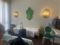 Triple room. There was a twin bed made up in the entry room of the suite.