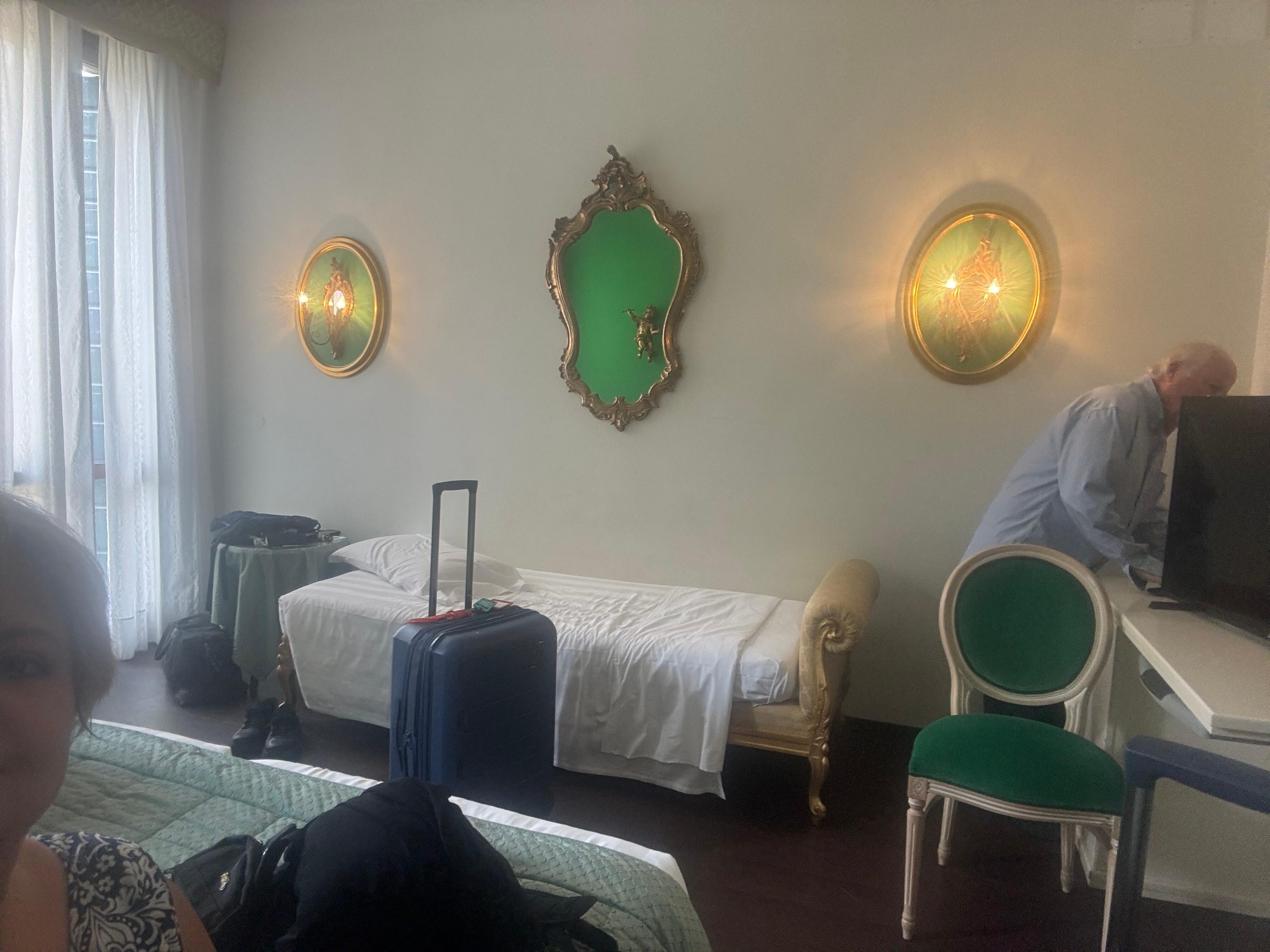 Triple room. There was a twin bed made up in the entry room of the suite. 