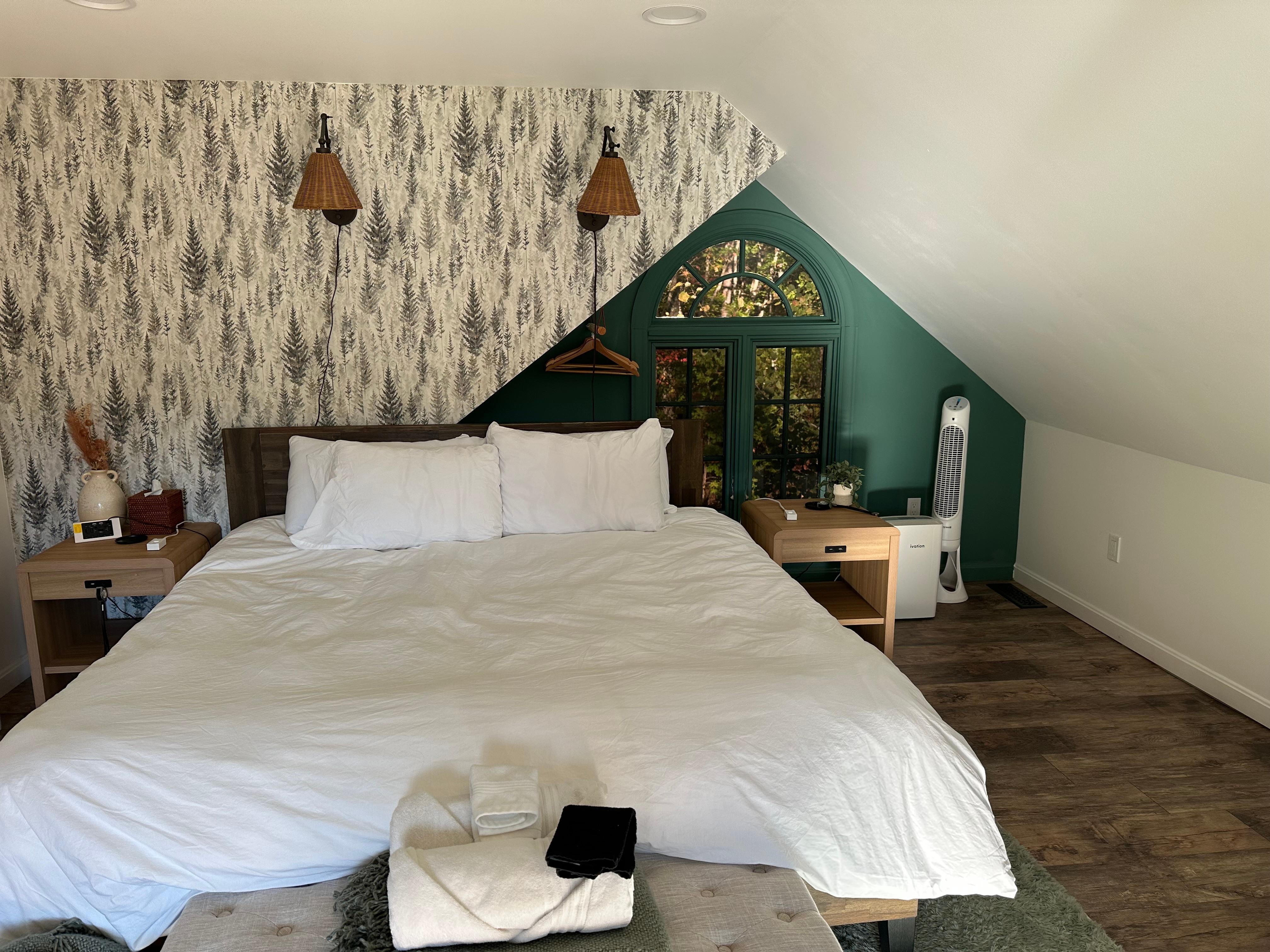 Primary bedroom upstairs with stunning view. (see last photo)