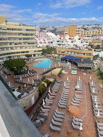 View of the pool from the side of the apartment