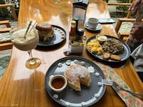 Pancakes and gallo pinto were included. Bagel i ordered on the side.