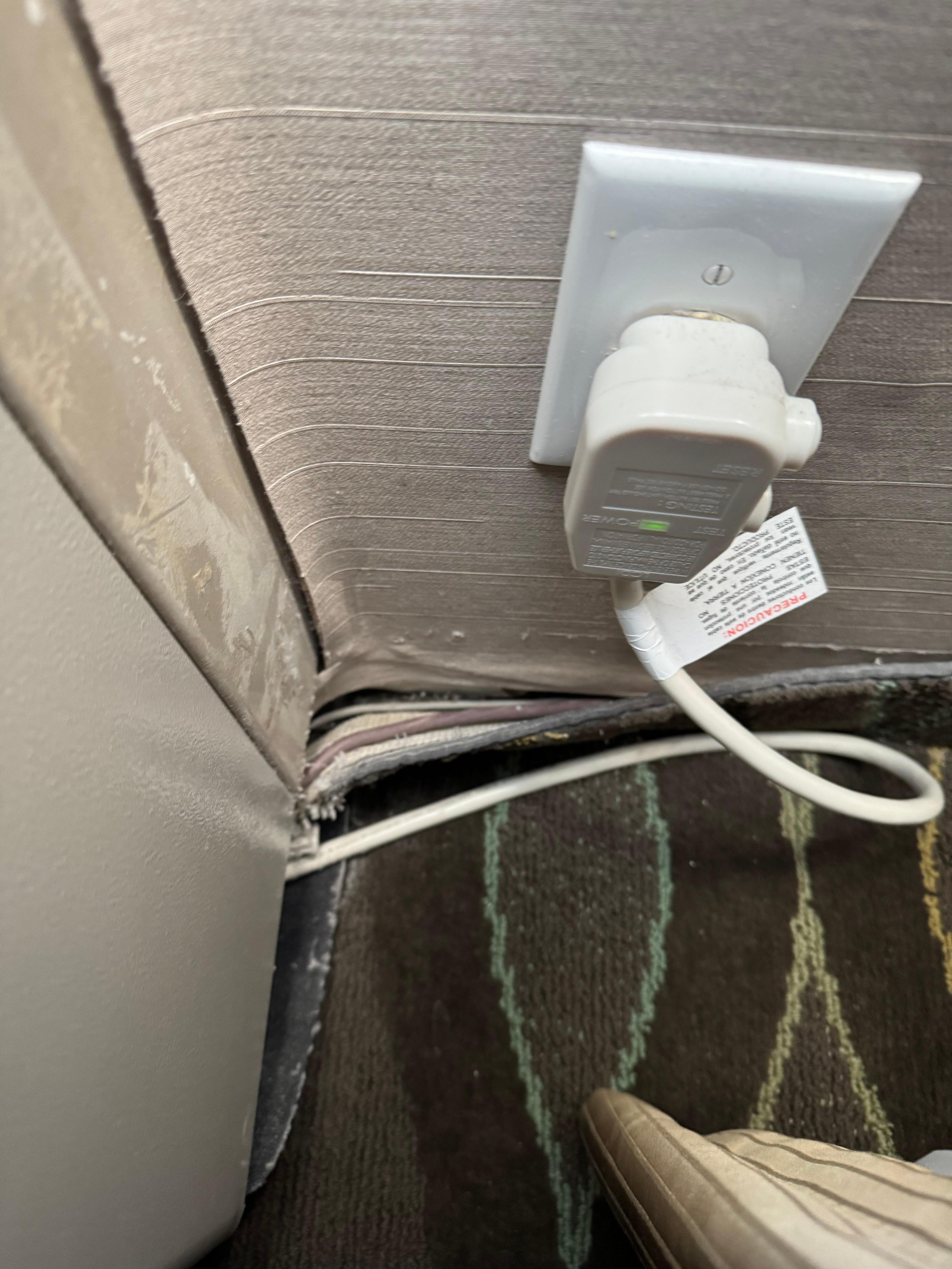 Carpet was unglued all over the room. 