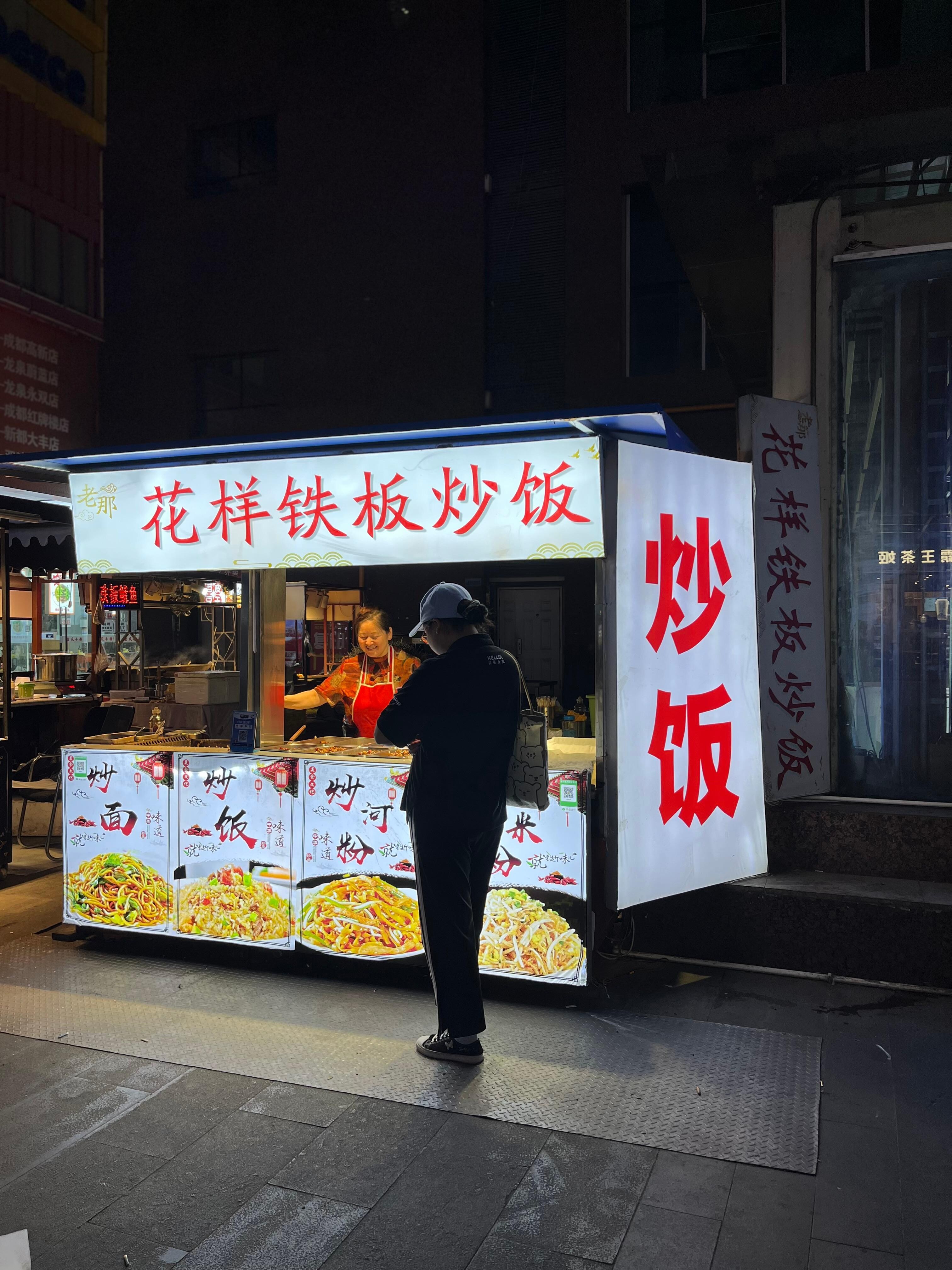 Fried noodle and rice stand in the food square nearby