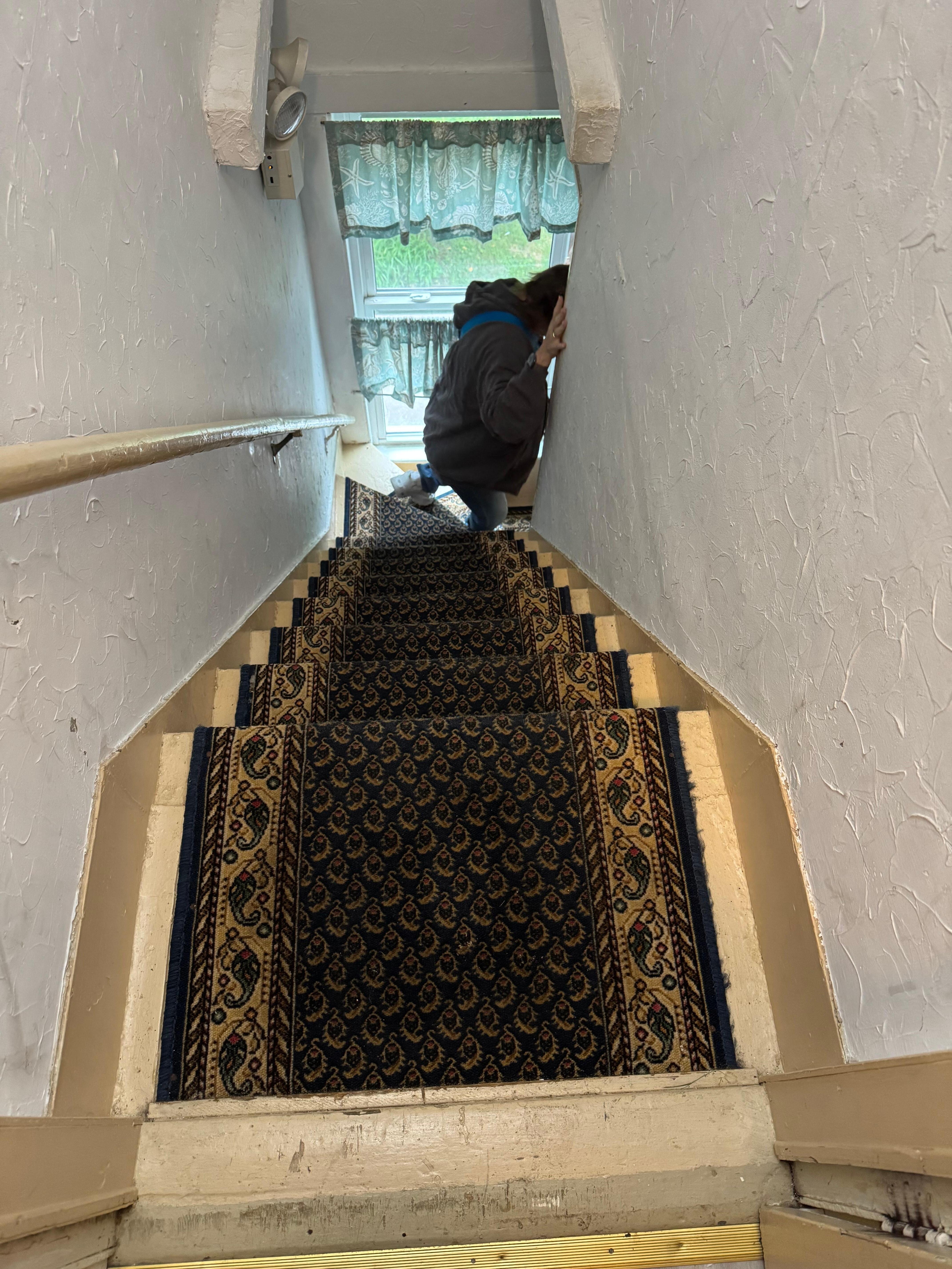 At the top of the inside stairs looking down