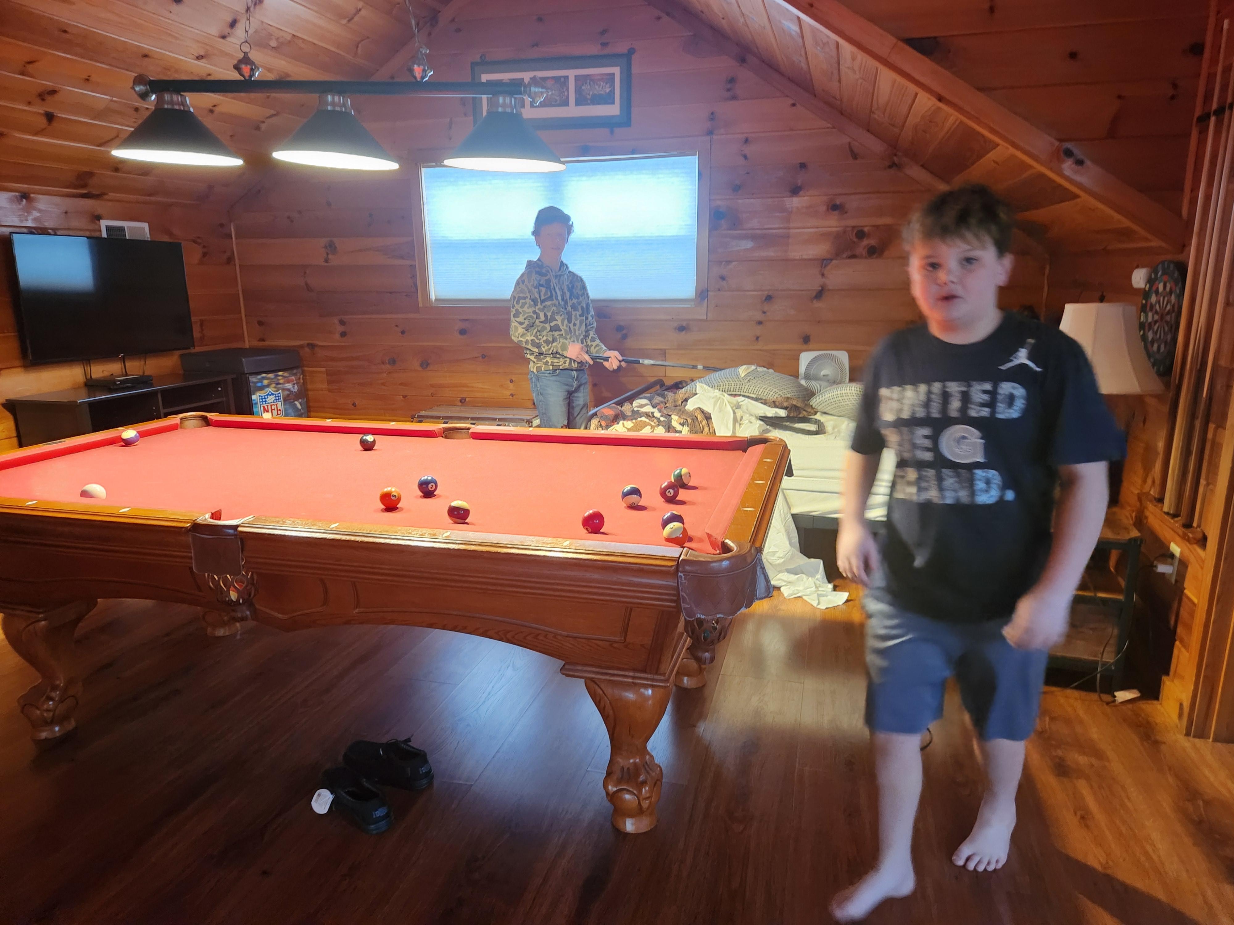 playing pool in the loft