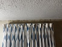 Water damage above window
