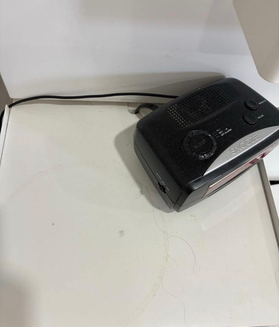 Dust on the clock and coffee stains