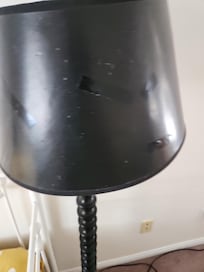 Example of broken lamp repaired with electrical tape