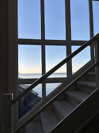 Sunset through the wall of windows.