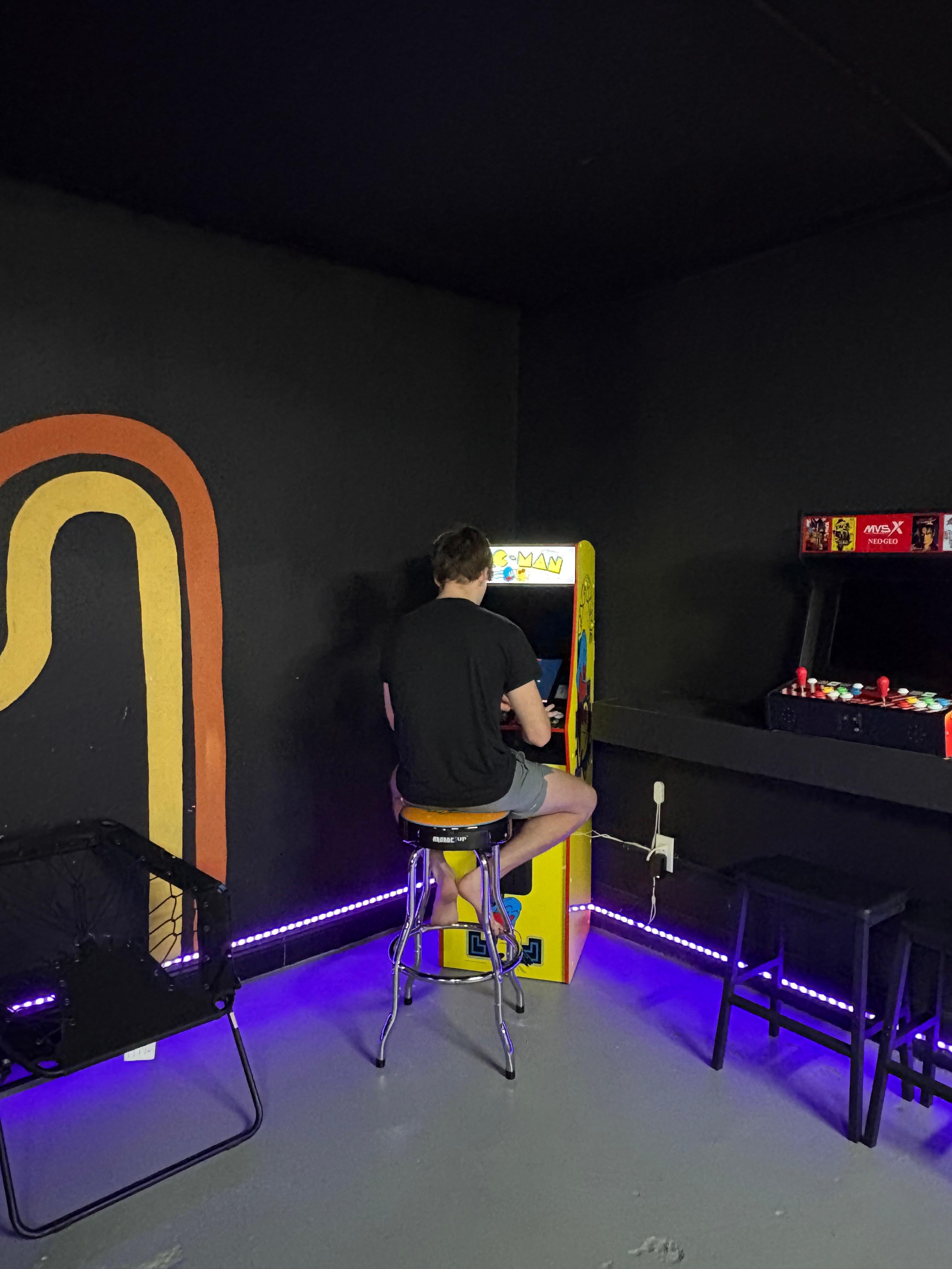 My favorite place! The game room with Galaga/PacMan, pool table and swings!!