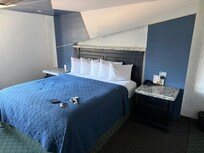 King size bed and two night stands, one on each side :)