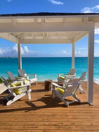Next to the pool, overlooking the beach