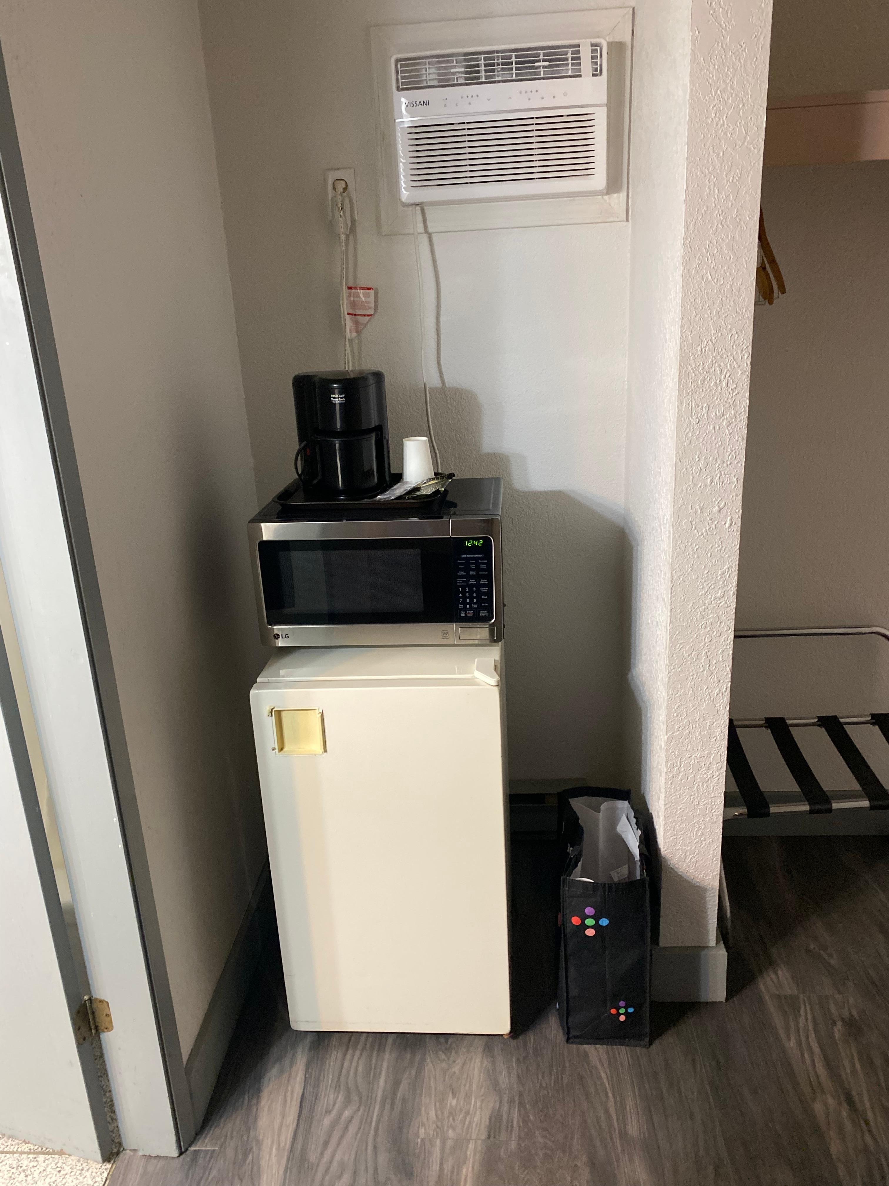 Mini fridge , microwave and AC 