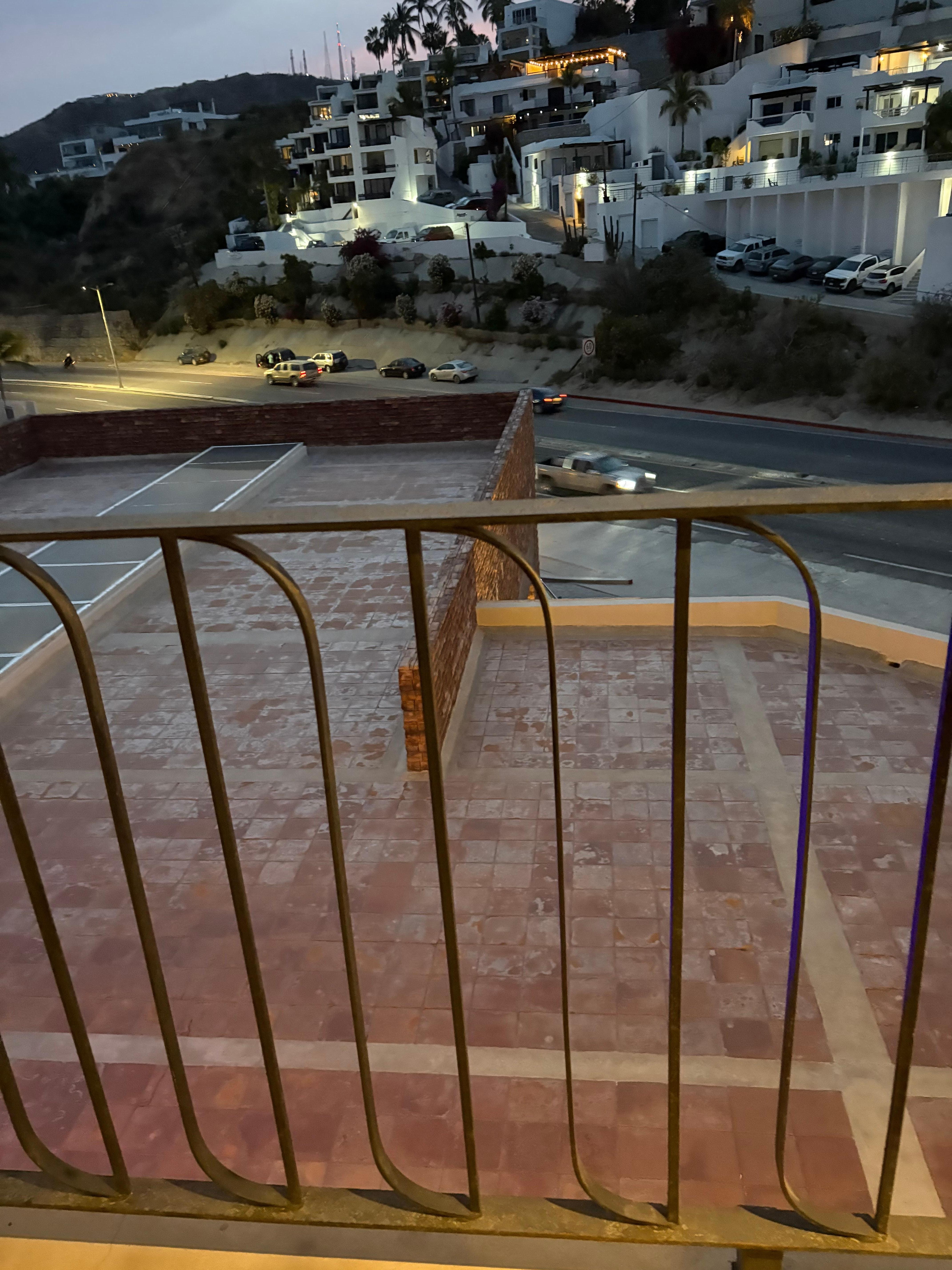 Hallway to rooms that back out on main road p