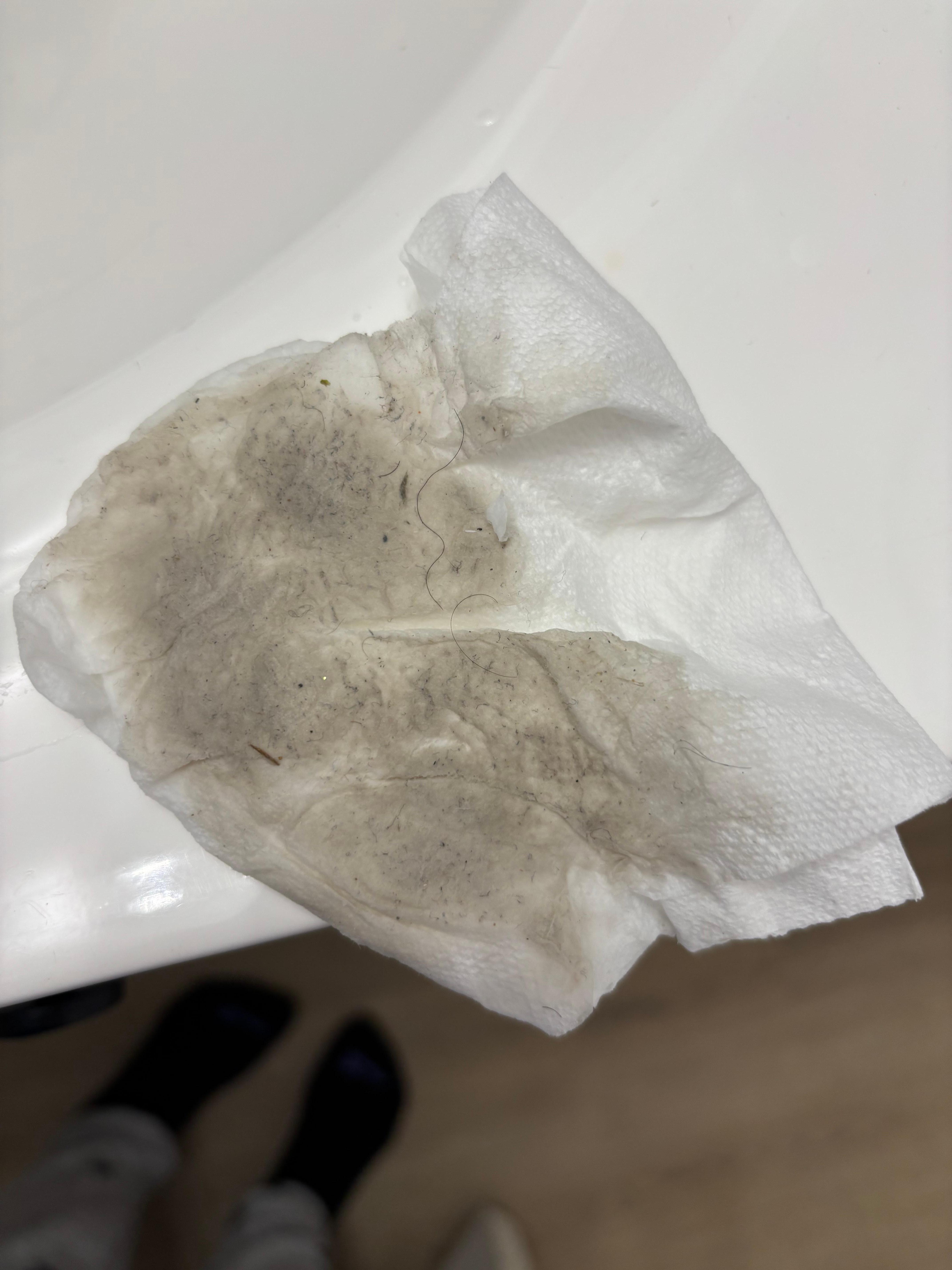 Floor after cleaning it with a paper towel