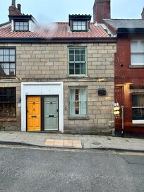 Quirky and quaint, narrow staircase which leads to two adjacent bedrooms on different levels.