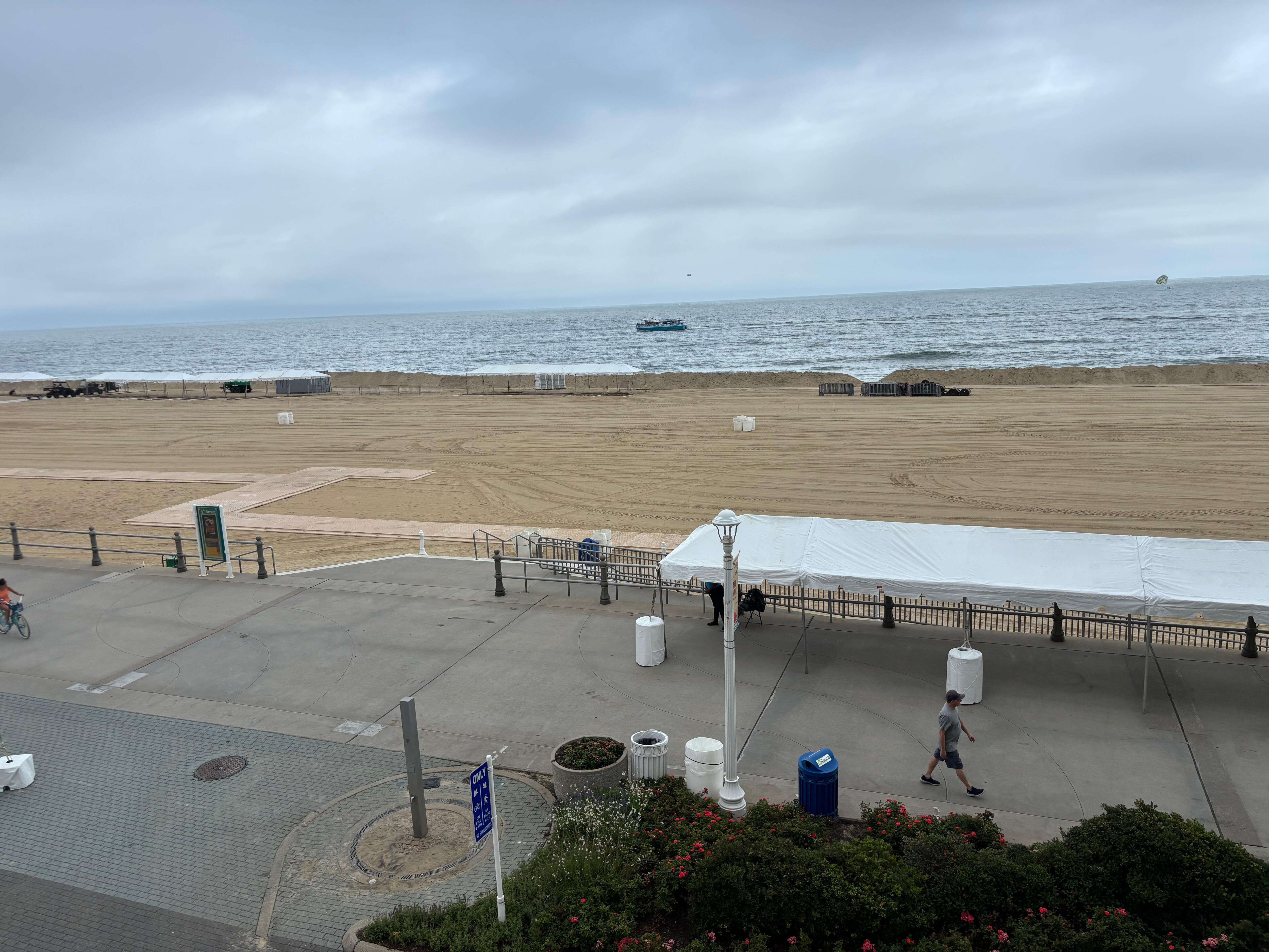 Ocean front blocked by mounded sand created for festival 