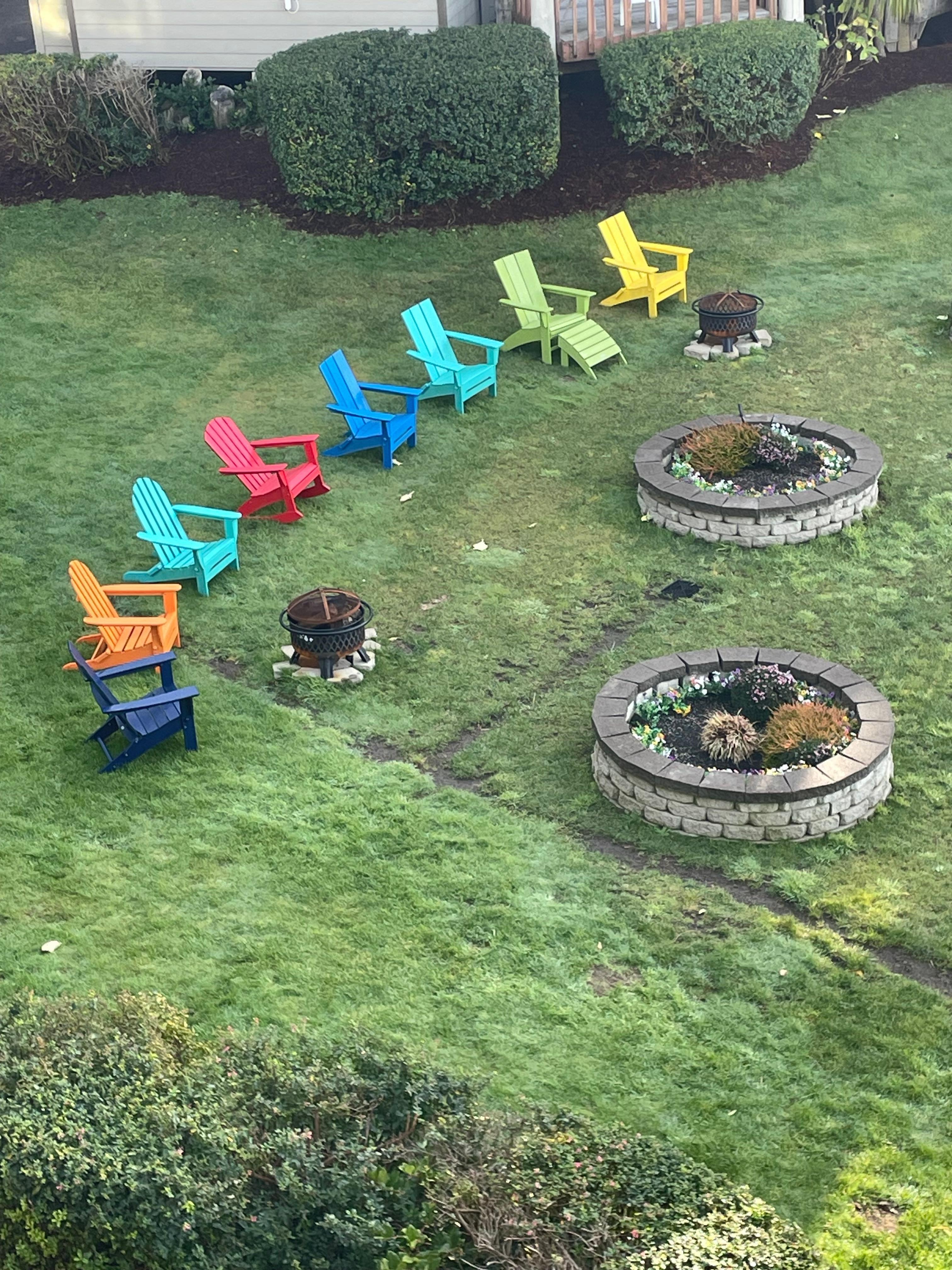 View from balcony of sitting area below in grassy area