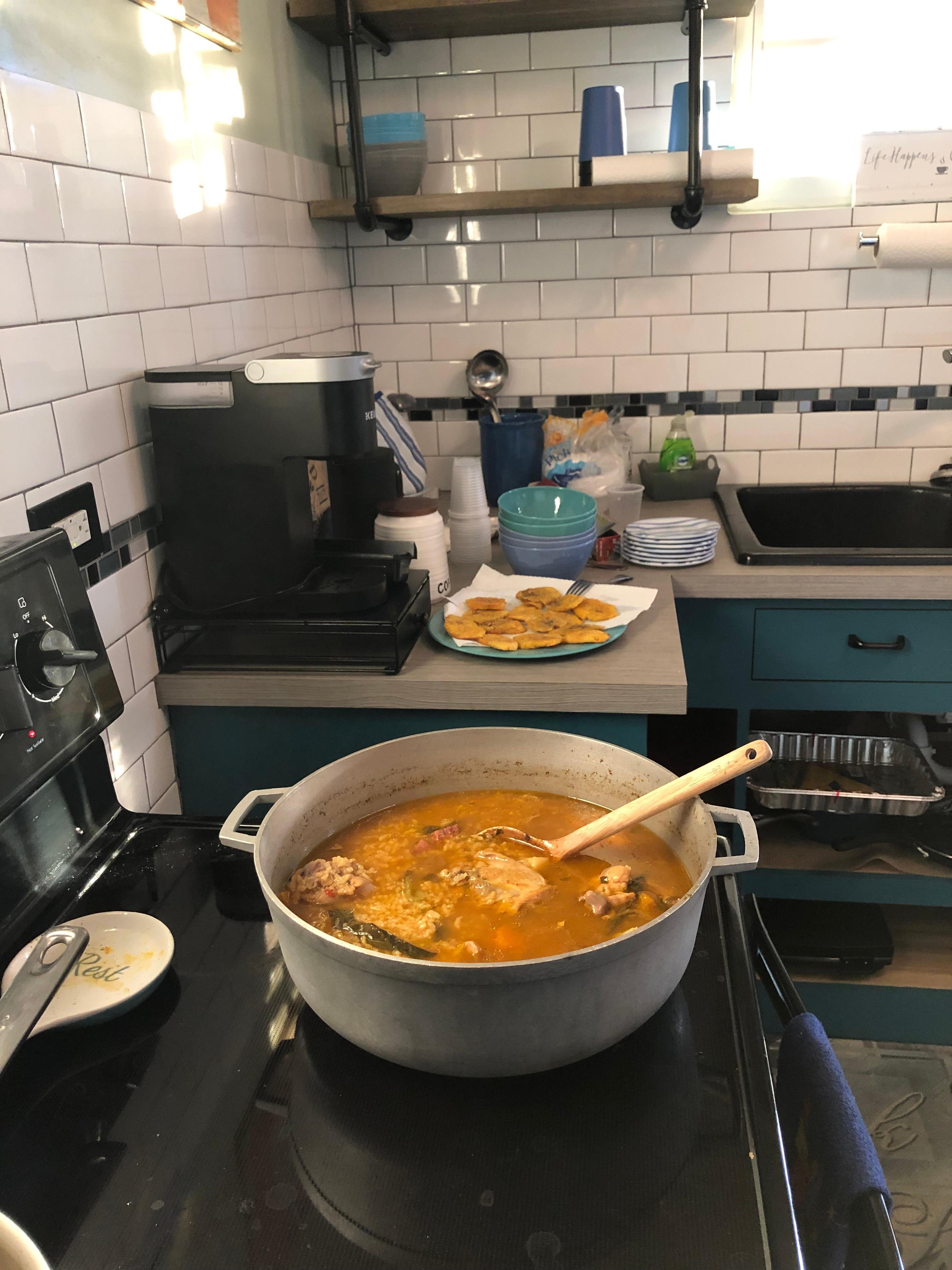 Making asopao & tostones in the fully-stocked kitchen.