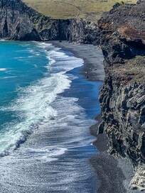 Opposite side of the black sand beach
