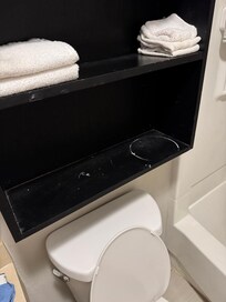 The shelves where they put your towels and toilet paper, doesn’t look like it has been wiped down and at least two weeks