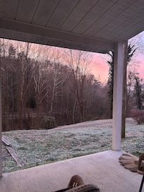 Sweetest front porch with great seating and beautiful views.