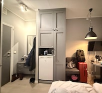 Fikk så vidt stuet bort kofferten.