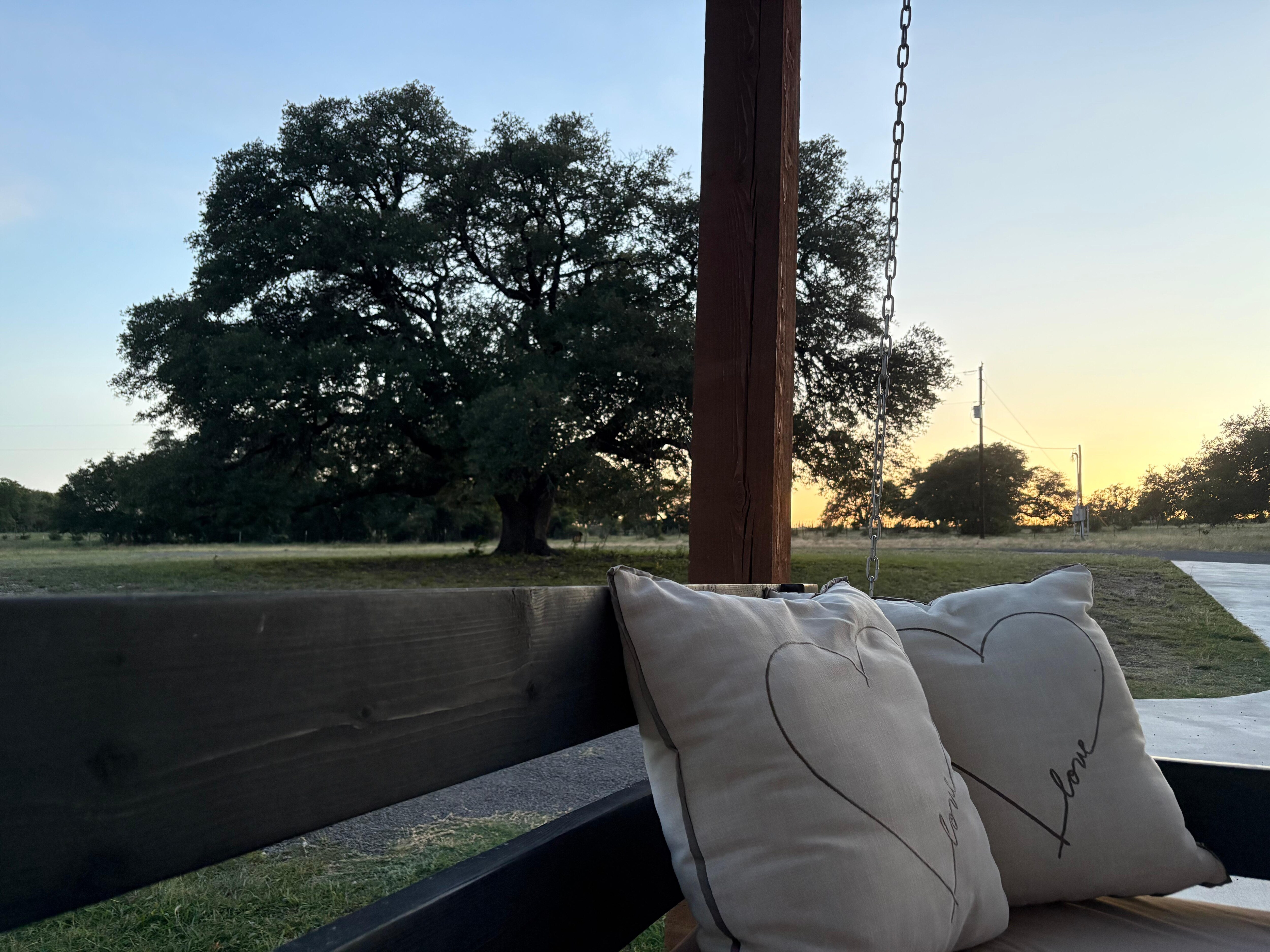 Relaxing on the front porch swing at sunset
