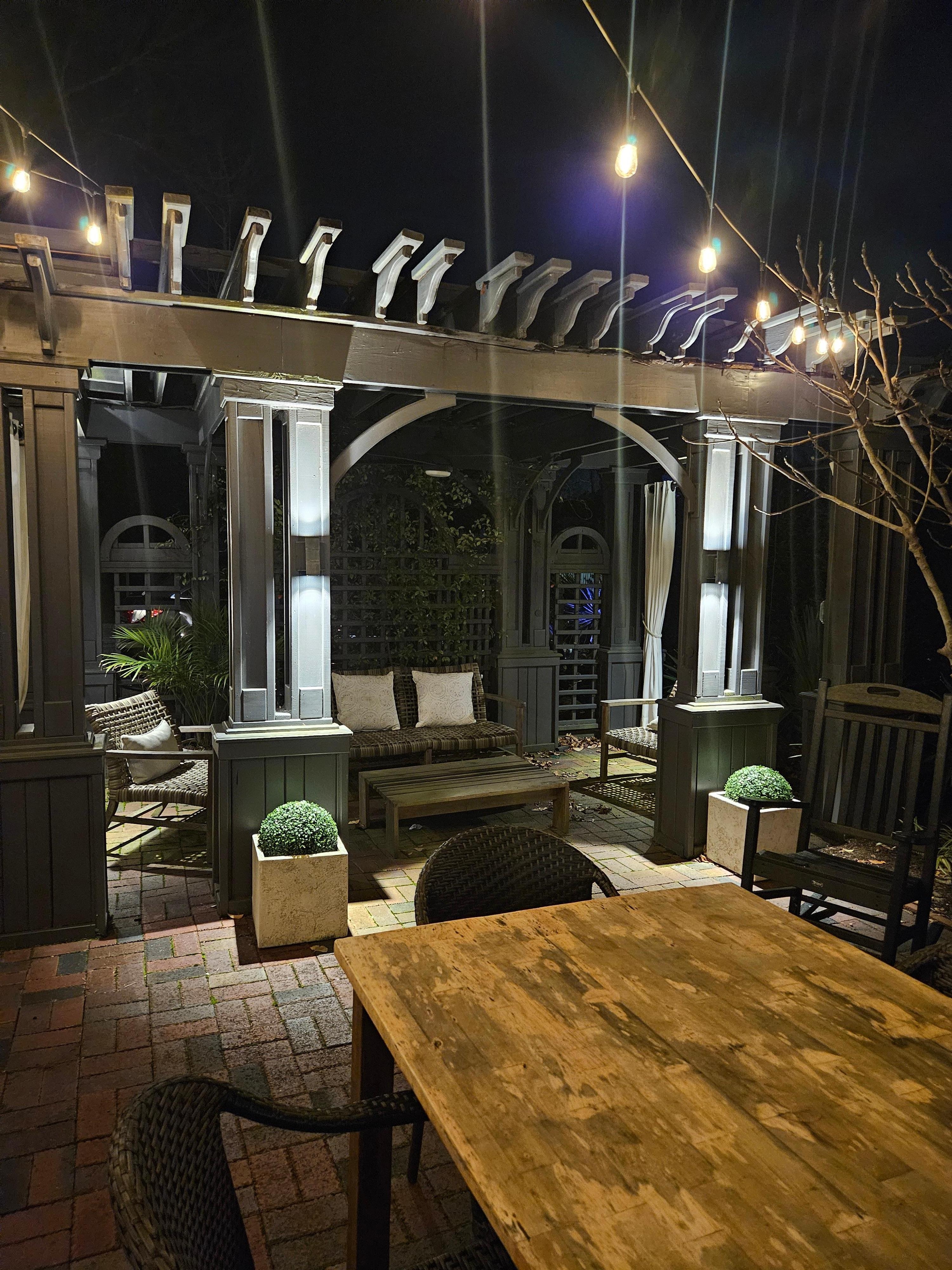 Gorgeous, welcoming patio with fire pit, comfy chairs and blankets.