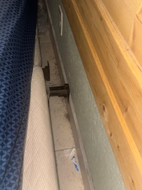 Behind the bed