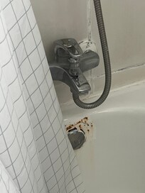 Main bath had rust and cracks in grout. Shower pressure caused shower head to spray bathroom