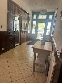 Looking at the front door from the living room/kitchen area.