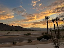From Homeland Suites parking area looking west at sunset.