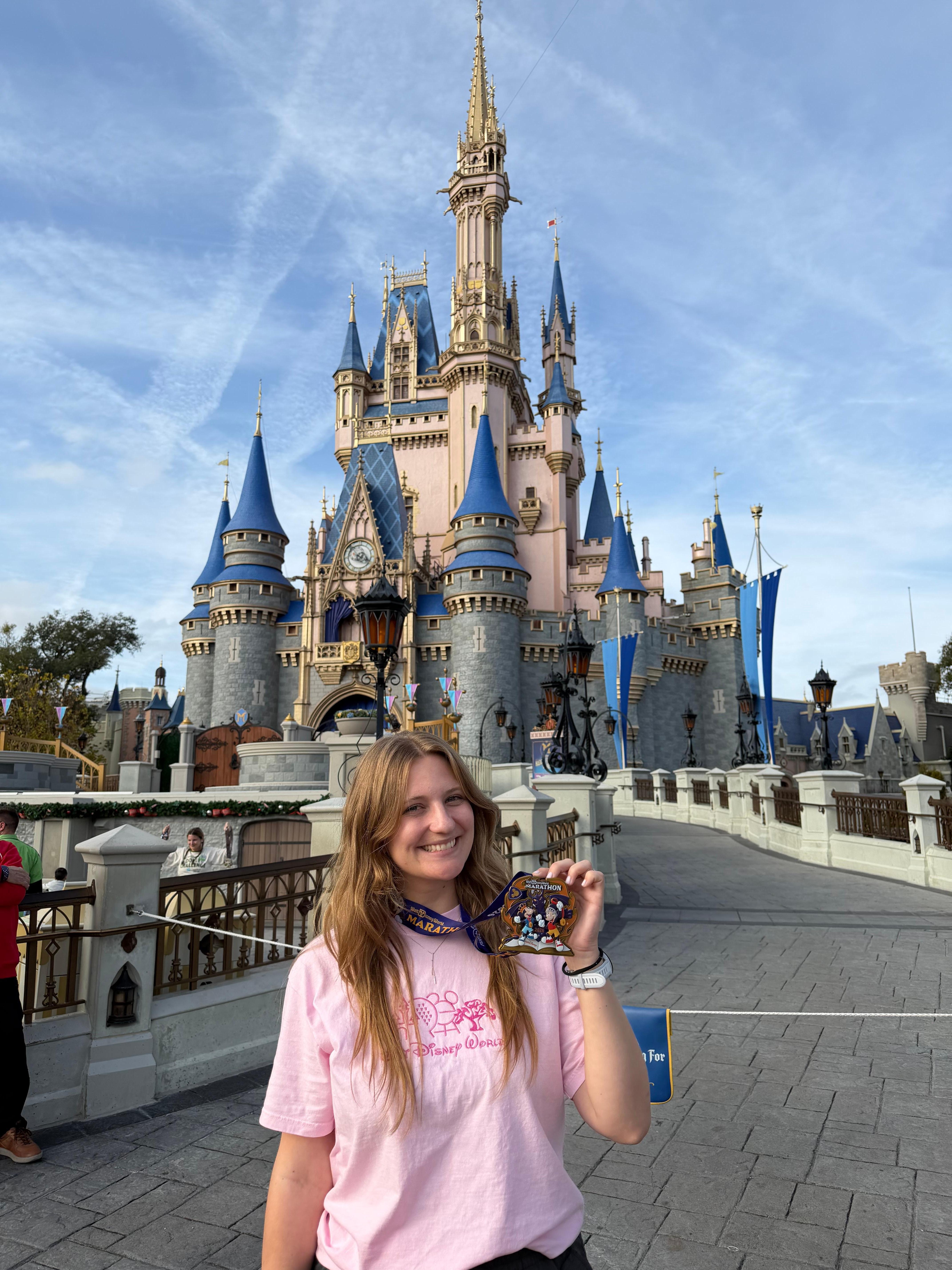 Runner with her medal