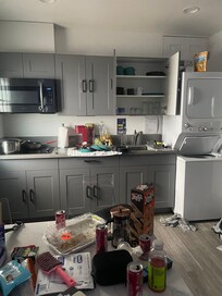 remember three kids two adults and soccer tournament; ignore our mess, so nice to wash laundry in room.