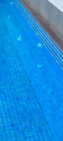 Missing and broken pool tiles