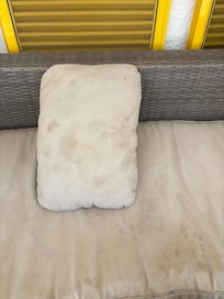 soiled patio couch