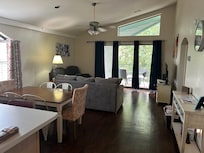 View entering condo of kitchen& dining/living room.