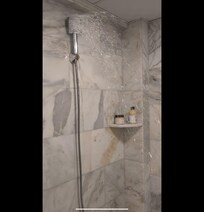 Broken shower head which gets straight when turned on