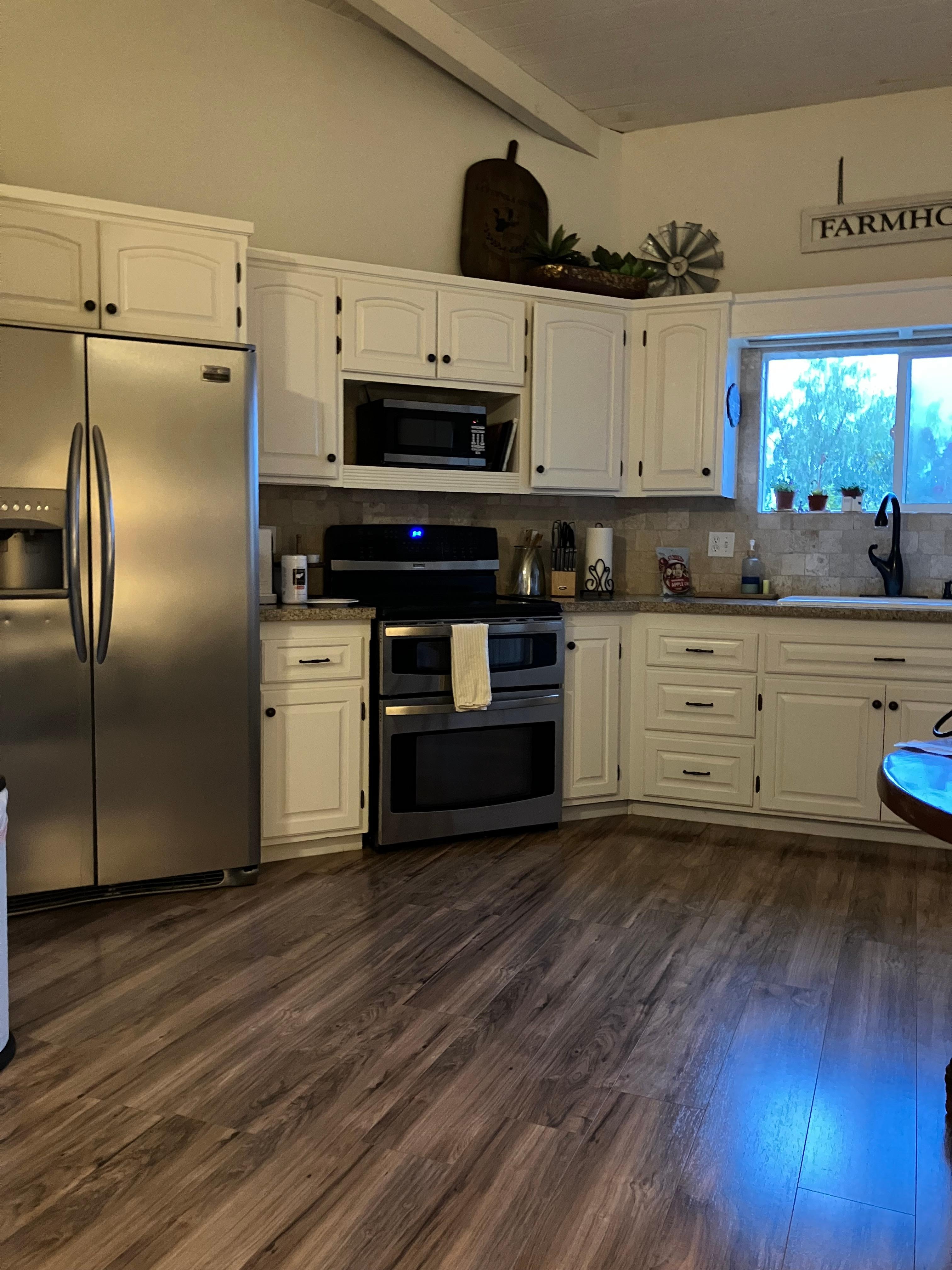Kitchen is very spacious and clean. 