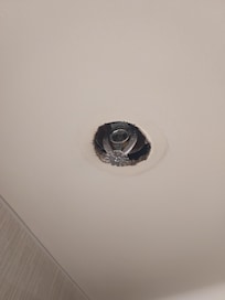 In the bathroom ceiling