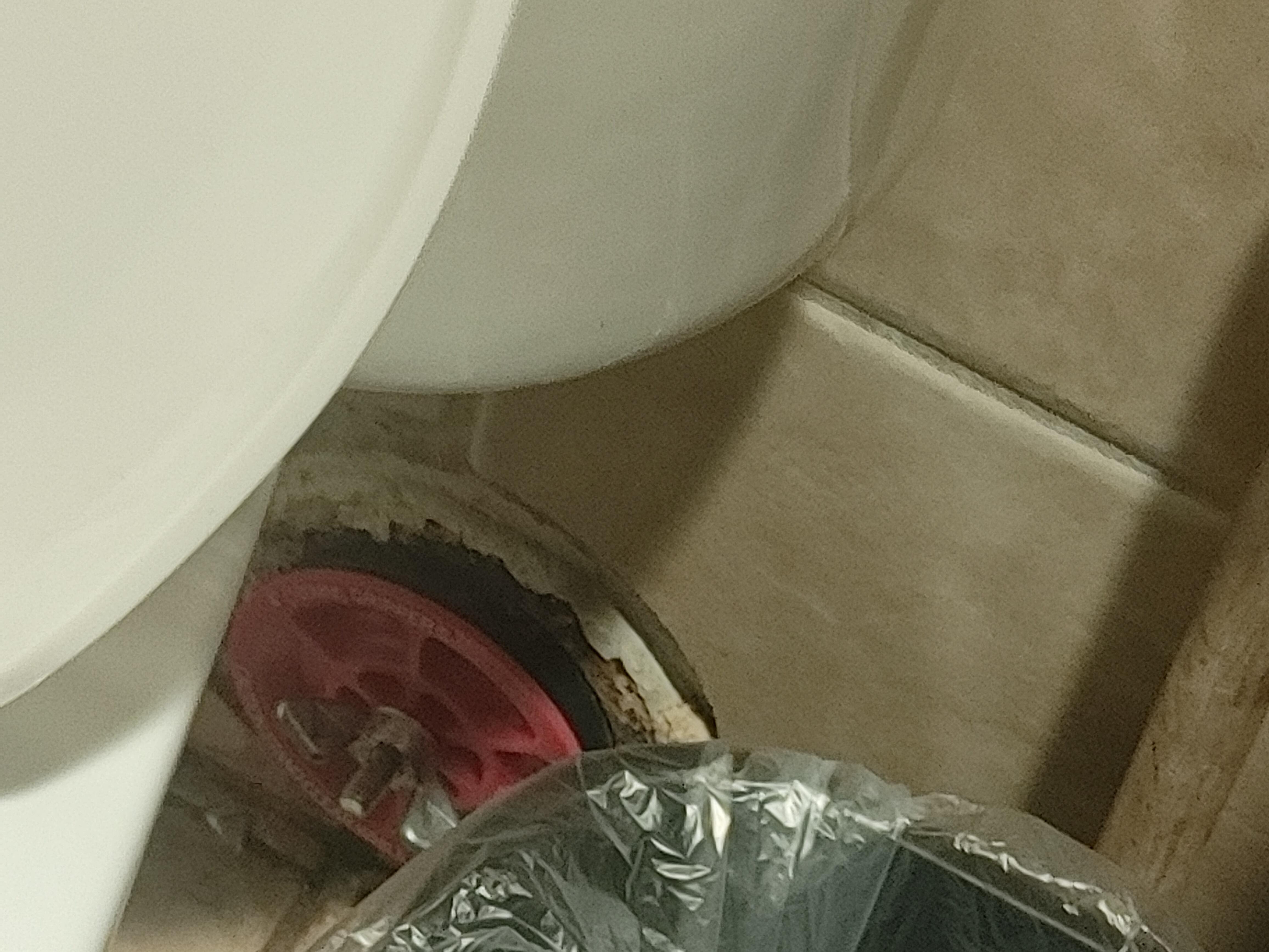 Something behind toilet unfinished