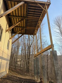 Underneath the brand new deck that apparently built 40 minutes before our check in which is when we found out that the deck would be off limits to use for the whole stay due to an inspection needed.