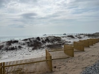 View from the boardwalk past the dunes and onto the beach.