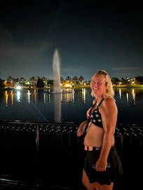 My wife standing on bridge midway of the pond at location was nice