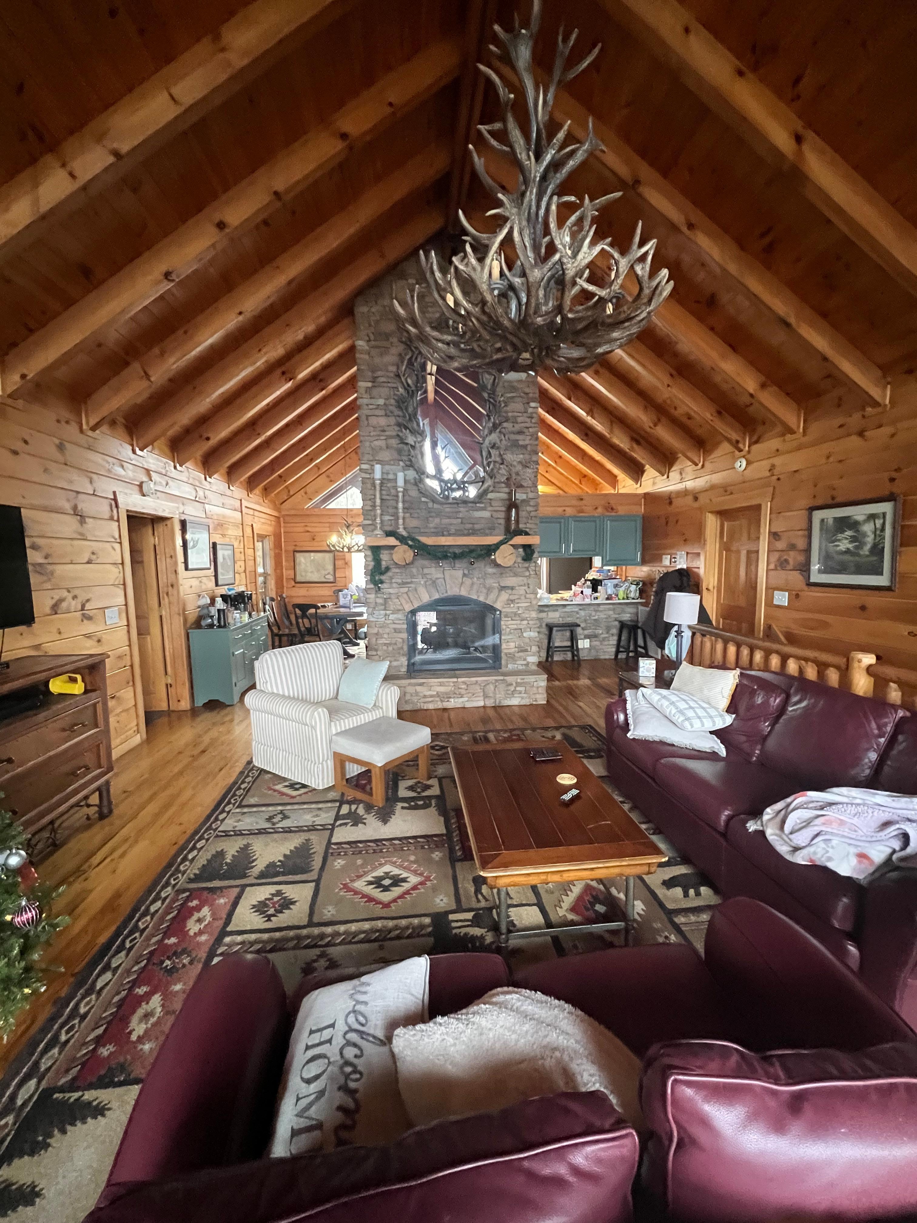 Large den, coffee bar, and cozy fireplace! 