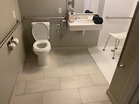 This is where the flood started. It was clear a design flaw. There is no drain in the middle of the bathroom. Only at the front of the shower