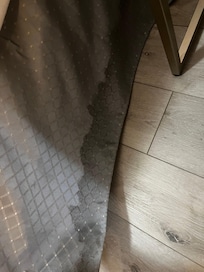Bedroom with queen bed skirt dirty